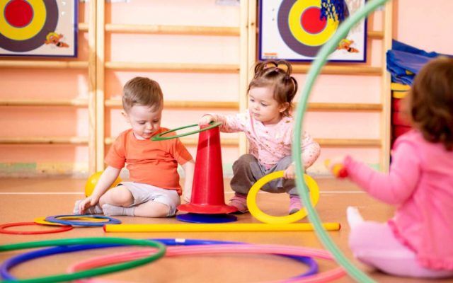 Nursery,Babies,Toddlers,Group,Play,With,Rings,In,Gym